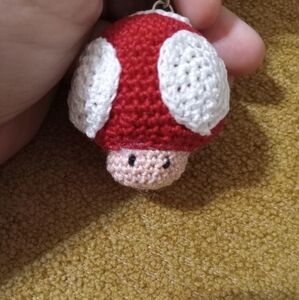 Handmade NWOT crochet Mario Mushroom keychain.
